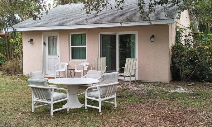 Englewood South Cabaña | Tropical Garden Cottage only 3 miles to beautiful Englewood Beach. Pet-friendly!