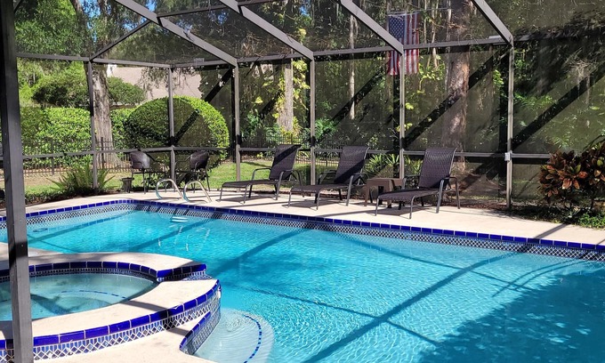 Temple Terrace Casa | Tropical Oasis with Lanai, Pool and Dock. Sleeps 12 guests