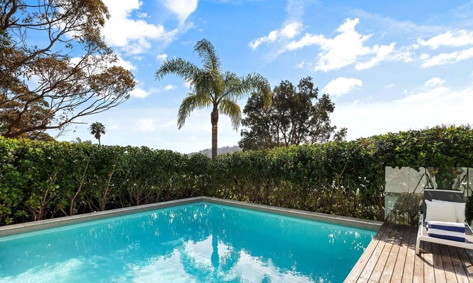Newport Casa | Tropical outlook with heated pool close to beaches