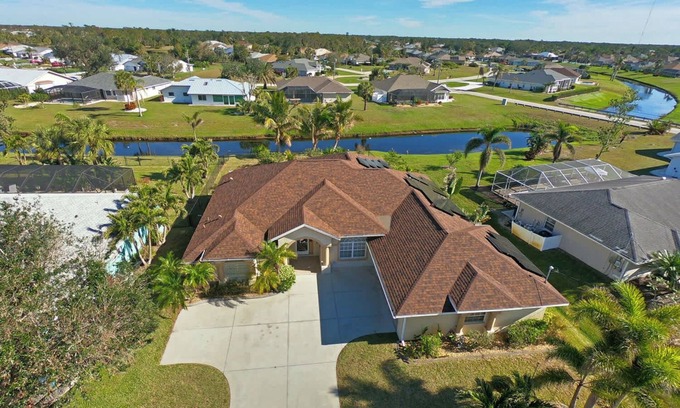 Pinehurst Casa | Tropical Waterfront Retreat: Poolside Paradise #138