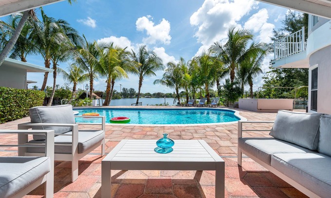 Ojus Casa | Tropical Waterfront Family Oasis - Heated Pool - Near the Beach & Aventura Mall!