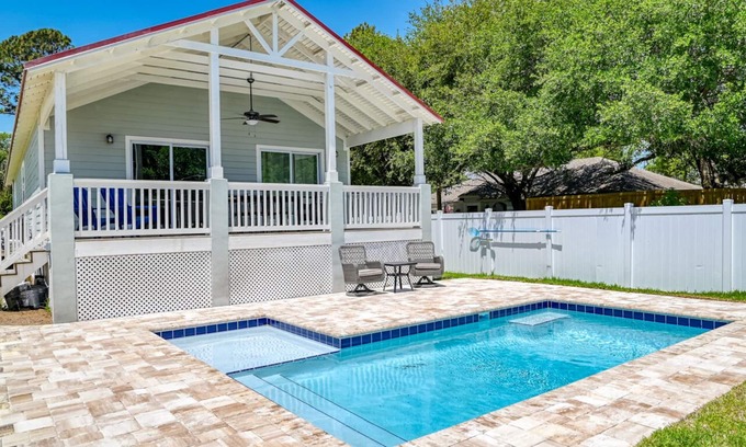Butler Beach Casa | Tropical Winds - Heated Pool & Firepit! Walk to the Beach!