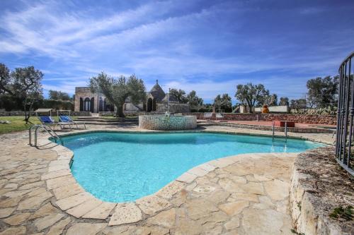 San Michele Salentino Casa | trullo degli ulivi con piscina e vasca per bambini