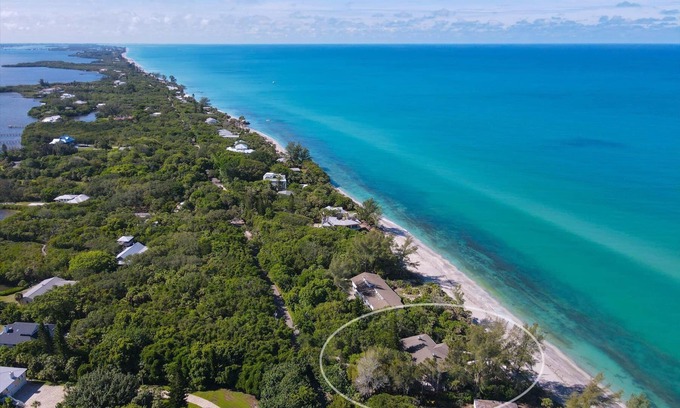Englewood Casa | Turtle Nest - 3 bedroom Beachfront home located on canopy lined road of Manasota Key.