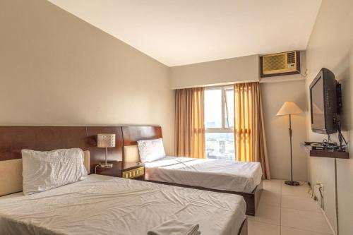 Ortigas Center Apartamento | Twin Bed Hotel Type by Ph Philstay