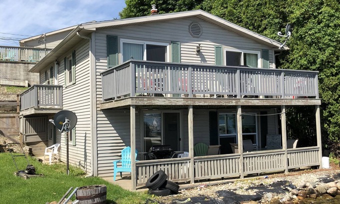 Manitou Beach-Devils Lake Cabaña | Two Bed Rooms with a sunrise lakefront view