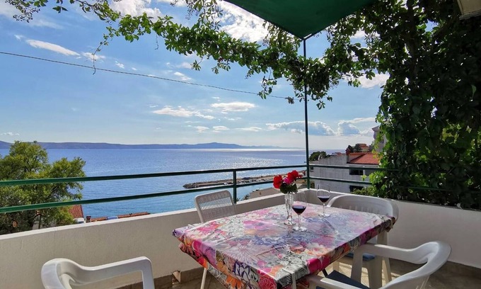 Zivogosce Apartamento | Apartamento para dos personas con balcón y vista al mar Zivogosce - Porat, Makarska (A-16289-d)