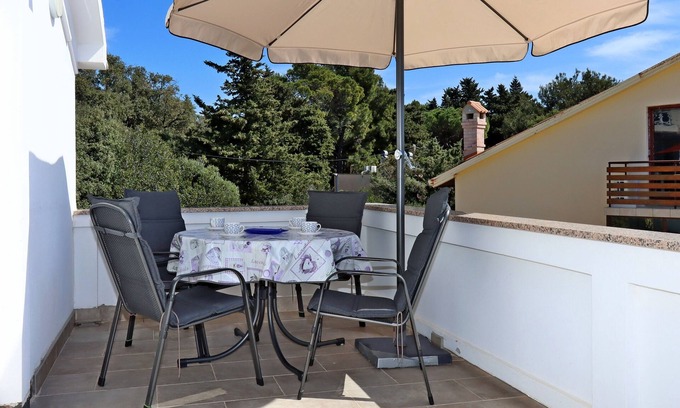Suha Punta Apartamento | Apartamento para dos personas con terraza y vista al mar Suha Punta, Rab (A-17239-b)