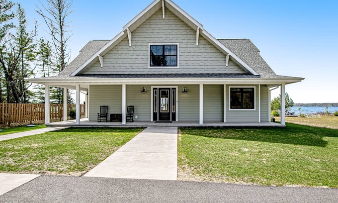 St Germain Casa | Two dog-friendly lakefront homes with docks, kayaks, rowboat, firepits & beach