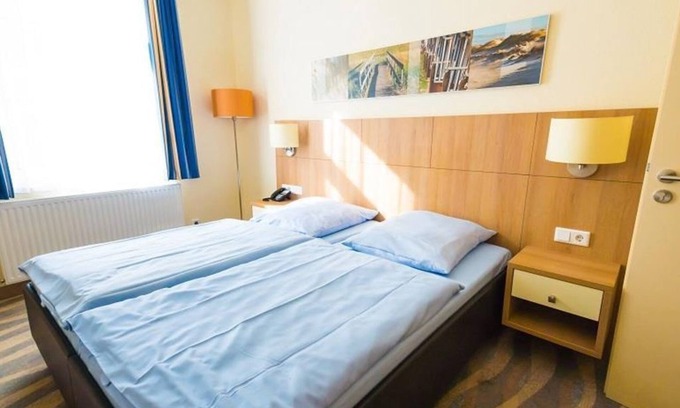 Norderney Casa | Two-room room comfort (up to 4 persons) - Hotel Garni Inselhotel Bruns
