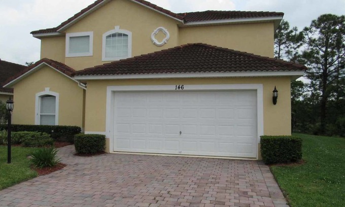 Lake Wilson Preserve Casa | Two story, spacious 4/3 Pool Home at Lake Wilson Preserve. Backed to a conservation area for enhance