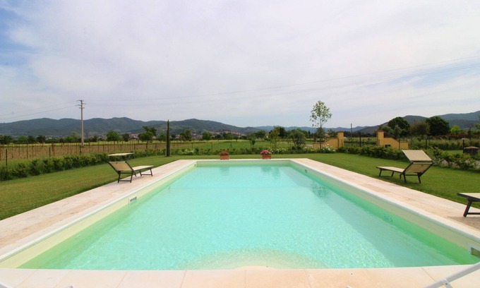 Le Piazze Villa | Typical Tuscan house with private and fenced swimming pool. View on the village of Castiglion Fioren