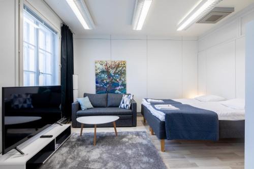 Varkaus Apartamento | Tyylikäs City studio, Terassi ja ilmainen parkki Vanha Postitalo