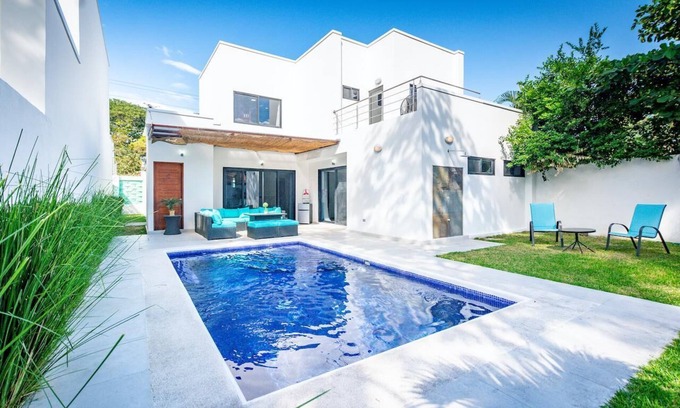 Potrero Villa | Ultramodern Townhome with an Inviting Coastal Design and Lush Outdoor Oasis with a Private Pool