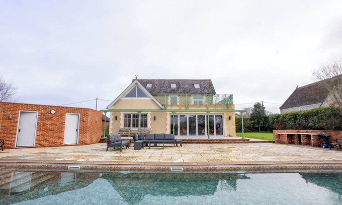 Shaftesbury Casa | Unique 7 Bedroom House with Skittle Alley, Seasonal Heated Pool and Playground.