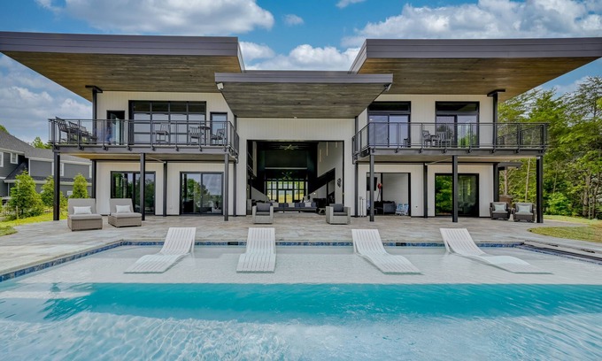 Bumpass Casa | Unique lake house with infinity pool, hot tub, modern interior, & views