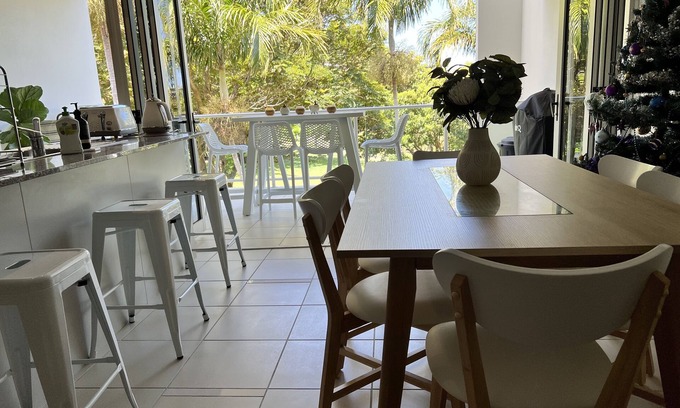 Nelly Bay Casa | Unit of Happy - enjoy mimosas at the marina in Nelly Bay, Magnetic Island