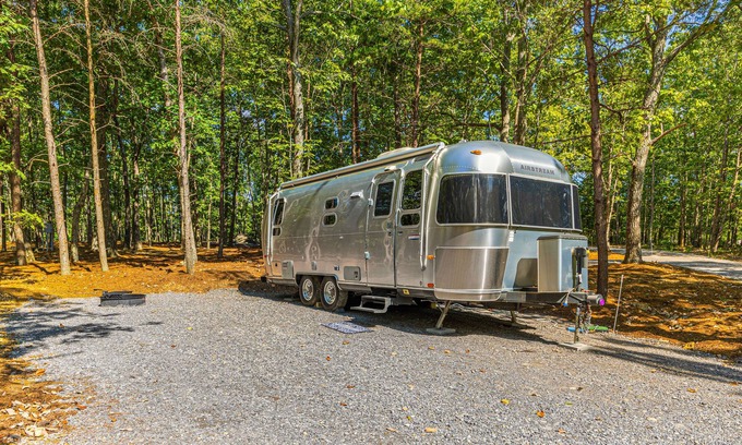 Menlo Casa | Updated Airstream tucked into trees with firepit, full bathroom & kitchenette