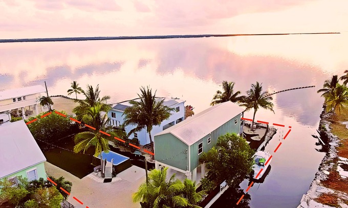 Sands Casa | Upscale ocean front home & easy canal boat access to Gulf or Atlantic