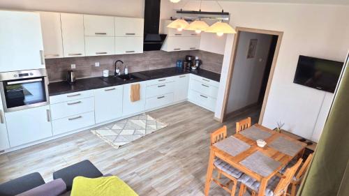 Wrzesnia Apartamento | Urban Green Września,Przytulny apartament z parkingiem