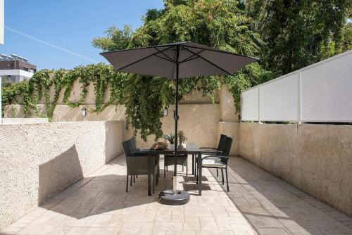 San Lorenzo Apartamento | Urban Oasis near Termini, free Parking&Patio, int3