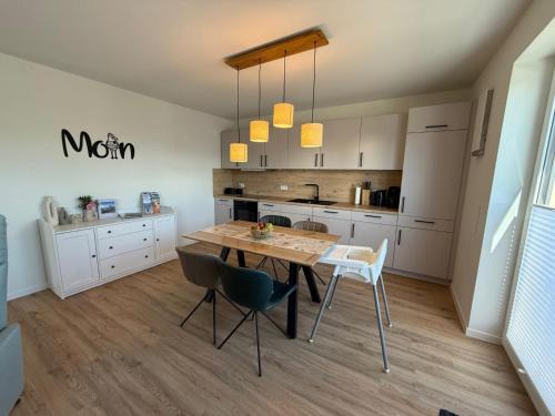 Tossens Apartamento | Urlaub an der Nordsee - NEUE Penthouse-Ferienwohnung Deichliebe, direkt hinterm Deich