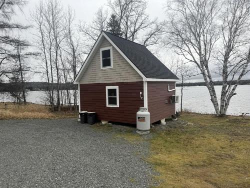 Portage Lake Casa | Magnificent Cabin Nestled Amidst Trees in Portage Lake, Maine
