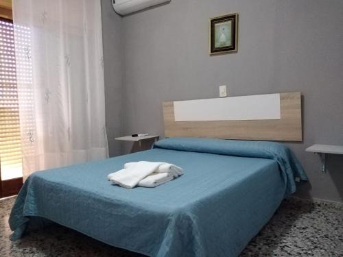 Cullera Casa | Vacansis Habitaciones de Hostal a Primera linea de playa en Cullera