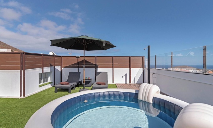 Agüimes Apartamento | Apartamento de vacaciones 'Unidad B' con vistas al mar, Wi-Fi y aire acondicionado