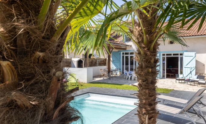 Saint-Martin-de-Seignanx Casa | Casa de vacaciones "L Ostal Luminosa" con piscina climatizada privada, 2 terrazas privadas y Wi-Fi