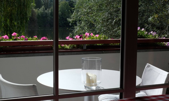Rothkreuz Apartamento | Vacation apartment directly on the Weissensberger Weiher near Lindau