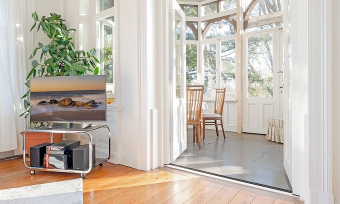 Eutin Apartamento | Vacation apartment Gartenzeit with conservatory in the Villa Eck in Eutin