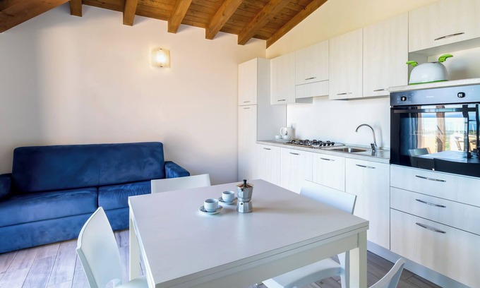 Paduledda Apartamento | Apartamento de vacaciones "Case Aquafan Mare" con vistas al mar, piscina y terraza