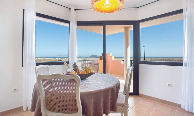 Geafond Apartamento | Apartamento de vacaciones 'Vista De Lobos' con vistas al mar, balcón y Wi-Fi