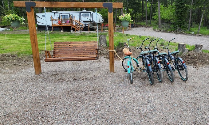 Lakeside Casa | Vacation Camper with private area behind with Seating, Firepit, and Hot tub