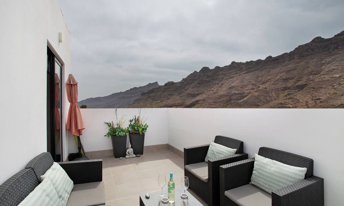 Mogan Apartamento | Vacaciones 'Dreaming Penthouse Mogan' con vistas a la montaña, Wi-Fi y aire acondicionado