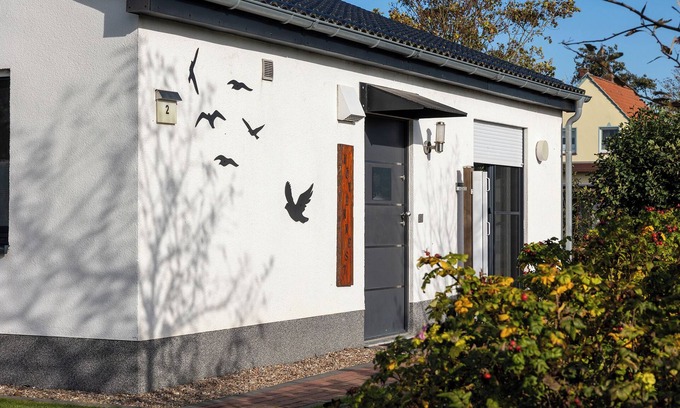 Dorumer Neufeld Casa | Vacation home Möwennest. With sun terrace and at ground level.