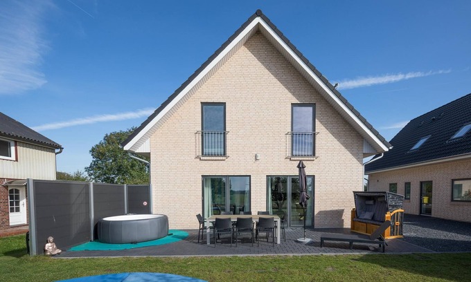 England Casa | Vacation home Ankerplatz in Nordstrand for up to 10 people