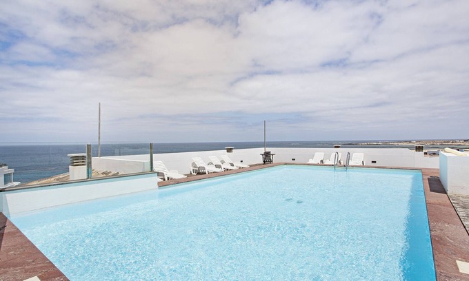 El Cotillo Casa | Casa de vacaciones 'Apart 3 Dormitorios Vista Mar 4' con vistas al mar, piscina compartida y Wi-Fi
