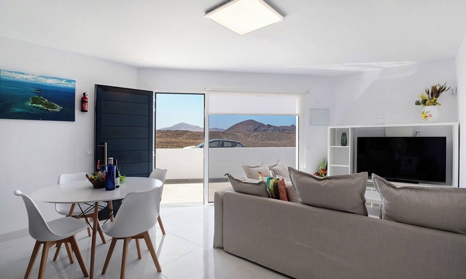 La Santa Casa | Casa de vacaciones 'Coral 5' con terraza compartida, Wi-Fi y aire acondicionado