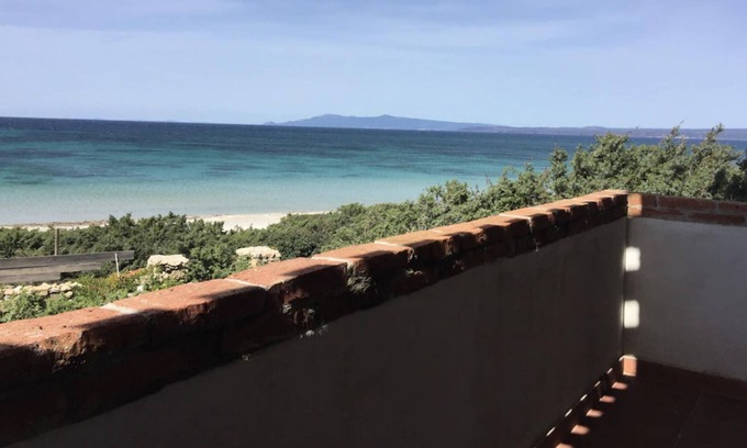 Sa Rocca Tunda Casa | Casa de vacaciones "Il suono del mare" en la playa, con vistas al mar, Wi-Fi, balcón y jardín