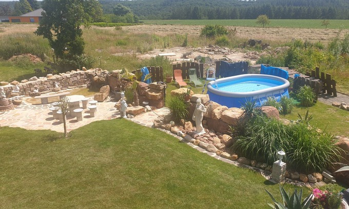 Landscheid Casa | Vacation home "Palmenland " with sauna, whirlpool, small waterfall and water place