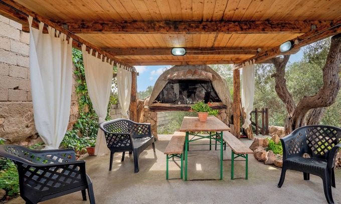 Loiri Porto San Paolo Casa | Casa de vacaciones "Suite Harmony" con terraza cubierta y descubierta