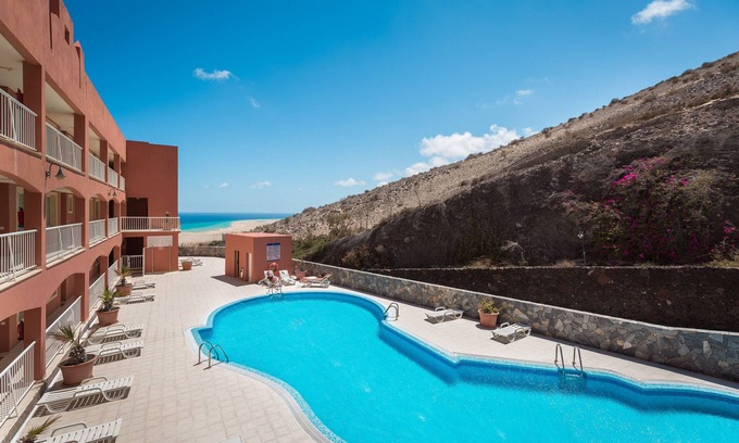 Pájara Apartamento | Vacaciones 'Home Sweet Home with Ocean View' con vistas al mar, piscina compartida y Wi-Fi