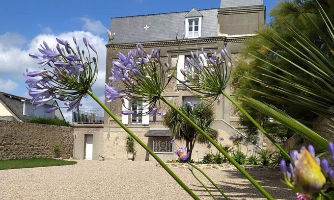Quineville Cabaña | Casa de vacaciones con acceso directo a la playa y jardín en Quinéville