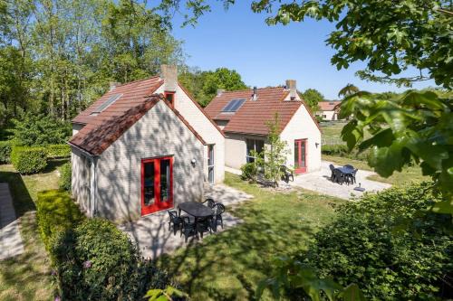 Ewijk Casa | Vacation house with sunny garden near lake
