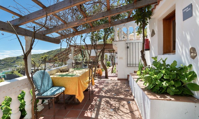 Las Lagunetas Apartamento | Vacaciones 'Junior Suite' con vistas a la montaña, Wi-Fi y aire acondicionado