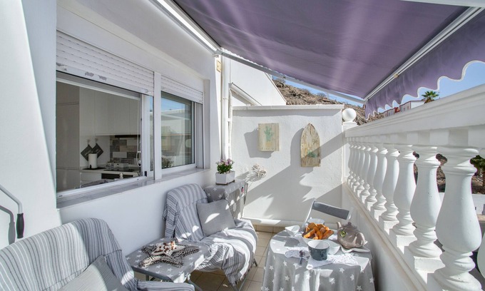 Arguineguin Apartamento | Estudio de vacaciones 'Estrella Del Mar Amazing Loft Casa' con vistas a la montaña
