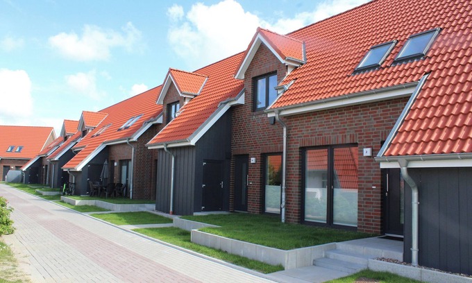 Wremen Apartamento | Vacation terraced house Spiekeroog. Family-friendly and elegant.