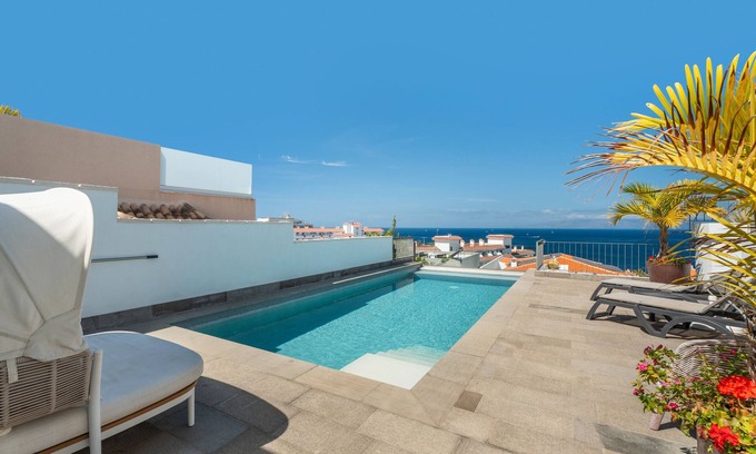 Santiago del Teide Villa | Villa de vacaciones 'Arenas 3 Playa La Arena' con vistas al mar, Wi-Fi y aire acondicionado
